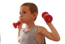 Young Boy Exercising with Dumbbells