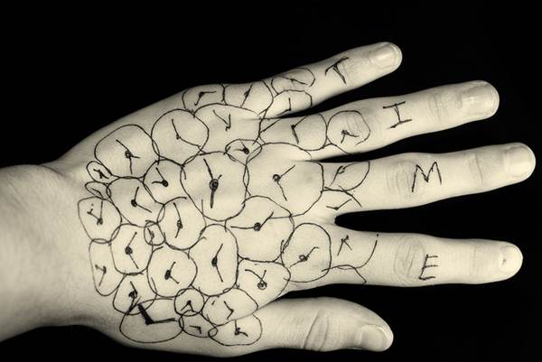 Time Clocks Drawn on Back of a Hand