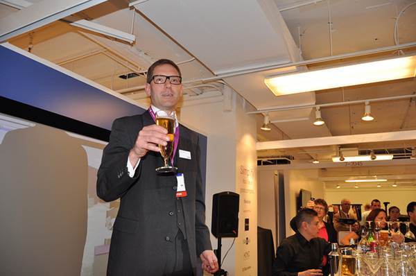 A CEO Raising a Toast at a Holiday Party in Office