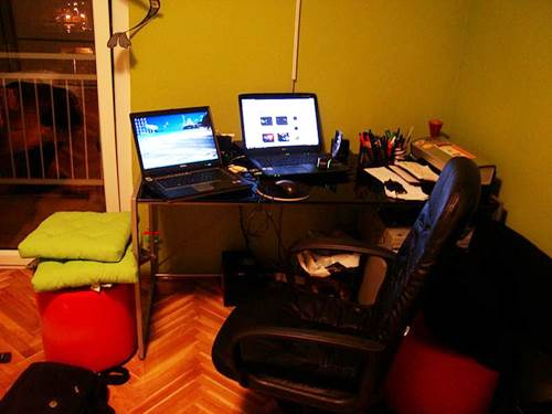 Home Office with Laptops and Leather Chair