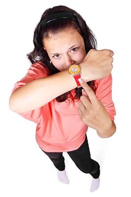 Girl Pointing to Her Wrist Watch