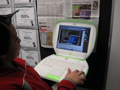 A 6th Grade Student Reading the Web Version of a Newspaper Article