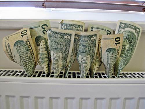 Dollar Bills Stuck in a Radiator Grill